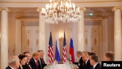U.S. President Donald Trump participates in an expanded bilateral meeting with Russia's President Vladimir Putin in Helsinki, Finland, July 16, 2018.