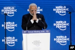 Prime Minister of India Narendra Modi greets the audience before his speech the World Economic Forum in Davos, Switzerland, Jan. 23, 2018.