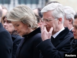 Belgian King Philippe and Queen Mathilde attend a commemoration ceremony at the Belgian parliament for victims of Tuesday's bombing attacks in Brussels, Belgium, March 24, 2016.
