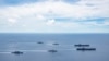 美国海军的尼米兹号和里根号航空母舰组成的双航母战斗群2020年7月6日在南中国海航行（美国海军提供）