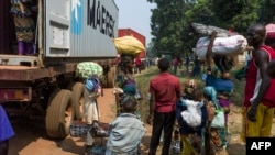 People flee Bangui for Cameroon by road, Feb. 22, 2014. 