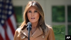 First lady Melania Trump speaks on her initiatives during an event in the Rose Garden of the White House, May 7, 2018, in Washington.