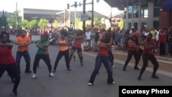 AfroMob performs contemporary African dance for surprised spectators