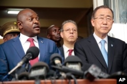 U.N. Secretary General Ban Ki-moon, right, listens as Burundi's President Pierre Nkurunziza speaks during a joint press conference in Bujumbura, Burundi, Feb. 23, 2016.