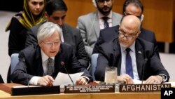 United Nations envoy for Afghanistan Tadamichi Yamamoto, left, addresses the United Nations Security Council, at U.N. headquarters, Monday, Sept. 17, 2018.