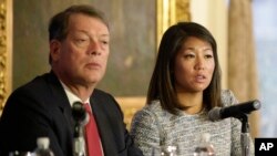 Crystal Pepper daughter of Dr. David Dao accompanied by attorney Stephen Golan, speaks at a news conference Thursday, April 13, 2017, in Chicago.