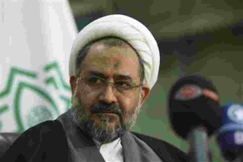 Iranian Intelligence Minister Heidar Moslehi, listens to a question during a press conference in Tehran, Iran, Tuesday, Jan. 11, 2011. Iran's intelligence chief revealed some details about the investigation into the January 2010 killing of nuclear physics