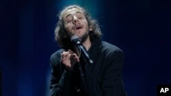 Salvador Sobral from Portugal performs the song "Amar pelos dois" after winning the Final of the Eurovision Song Contest, in Kiev, Ukraine, May 13, 2017.