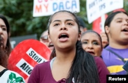 Rocio, a Deferred Action for Childhood Arrivals (DACA) program recipient, shouts with supporters during a rally outside the Federal Building in Los Angeles, Sept. 1, 2017.
