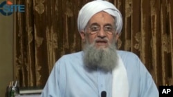 In this image taken from video, Ayman al-Zawahri, head of al-Qaida, delivers a statement in a video which was seen online by the SITE monitoring group, released Sept. 4, 2014. 