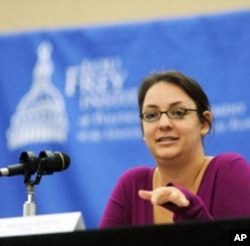 Maya Enista giving a speech at the Lew Frey Institute in Orlando, Florida.