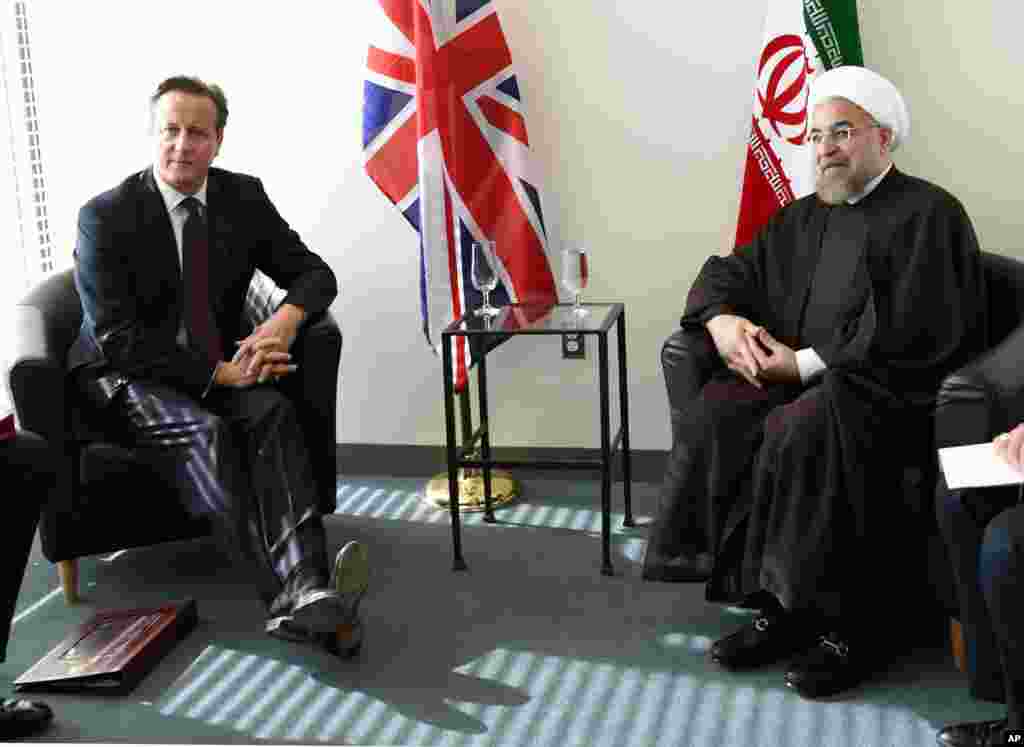 British Prime Minister David Cameron meets with Iranian President Hassan Rouhani at the UN during the 69th Session of the UN General Assembly, Sept. 24, 2014. 