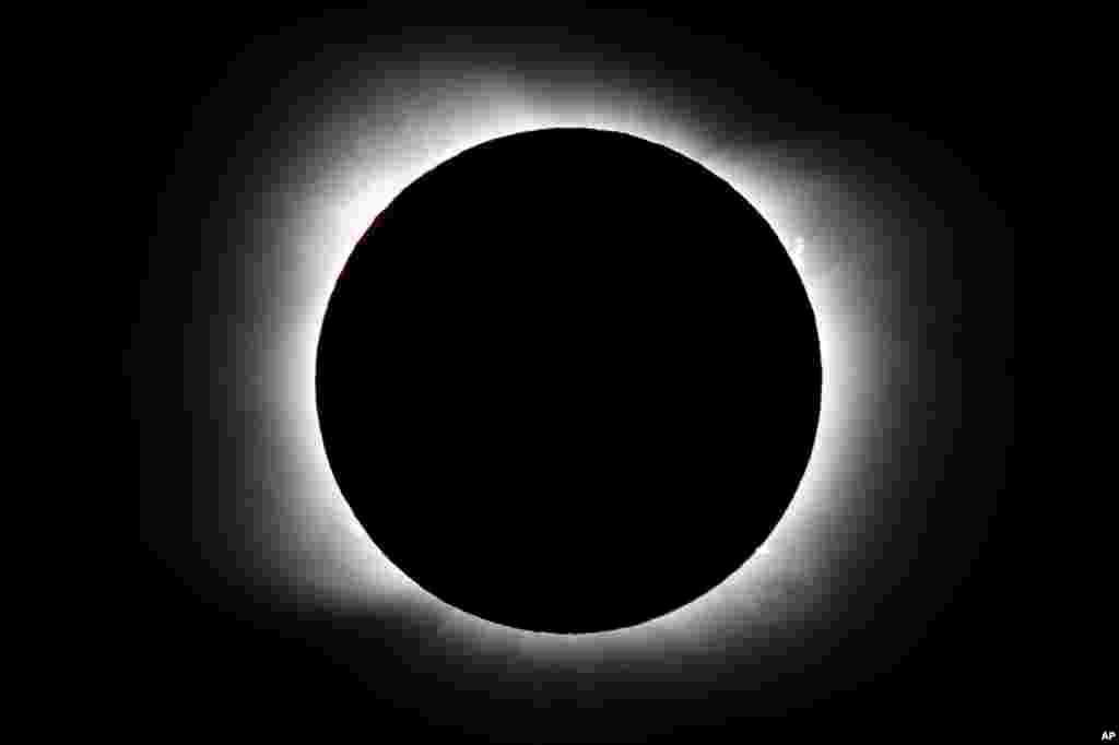 The moon covers the sun during a total solar eclipse in Piedra del Aguila, Argentina.