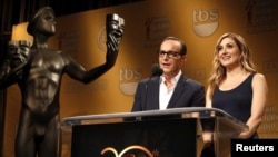 Actors Clark Gregg and Sasha Alexander announce nominees for the 20th Annual Screen Actors Guild Awards at Pacific Design Center's Silver Screen theater in West Hollywood, California, Dec. 11, 2013. 