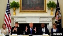 U.S. President Donald Trump speaks during a lunch meeting with Senate Republicans to discuss health care at the White House in Washington, July 19, 2017.