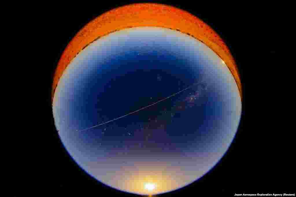 A fireball from Hayabusa2&#39;s capsule carrying the first extensive samples of an asteroid is seen as it reentered the Earth&#39;s atmosphere while it is observed at Coober Pedy, Australia.