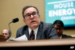 FILE - Environmental Protection Agency Administrator Andrew Wheeler testifies before the House Environment and Climate Change Subcommittee on Capitol Hill, April 9, 2019.