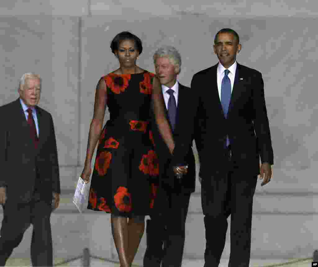 President Barack Obama, first lady Michelle Obama, former president Bill Clinton and former president Jimmy Carter arrive at the Let Freedom Ring ceremony at the Lincoln Memorial, Aug. 28, 2013, to commemorate the 50th anniversary of the 1963 March on Washington.