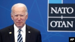 FILE - U.S. President Joe Biden arrives for a NATO summit at NATO headquarters in Brussels, June 14, 2021,