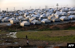 FILE - A view of a camp for displaced Iraqis in Khanke, a few kilometers (miles) from the Turkish border in Iraq's Dohuk province, January 25, 2015.