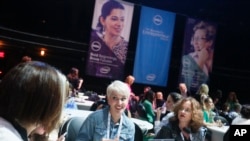 FILE - Attendees talk during a Dell Women’s Entrepreneur Network event in Austin, Texas, June 2, 2014.