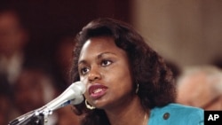 FILE - University of Oklahoma law professor Anita Hill testifies before the Senate Judiciary Committee on Capitol Hill, Oct. 11, 1991.