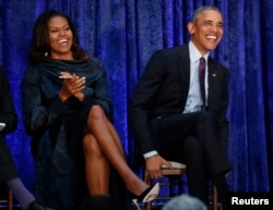 Mantan Presiden Barack Obama dan istrinya, Michelle Obama di National Portrait Gallery di Washington, 12 Februari 2018.(Foto: Reuters)