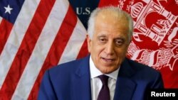 U.S. special envoy for peace in Afghanistan, Zalmay Khalilzad, talks with local reporters at the U.S. embassy in Kabul, Afghanistan, Nov. 18, 2018. 