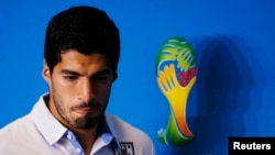 Uruguay's national soccer team player Luis Suarez attends a news conference prior a training session at the Dunas Arena soccer stadium in Natal, June 23, 2014. 