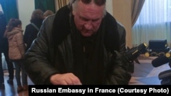 Gerard Depardieu votes at the Embassy of Russia in Paris, France, March 18, 2018 in this picture obtained from social media. 