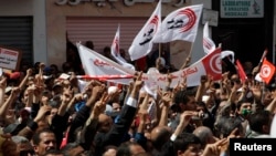 Members of the Tunisian General Labour Union mark International Workers' Day, Tunis, May 1, 2012.