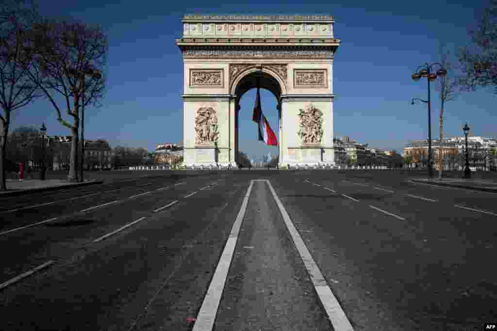 The Arc de Triomphe in Paris is pictured as a strict lockdown is in effect in France to stop the spread of COVID-19.