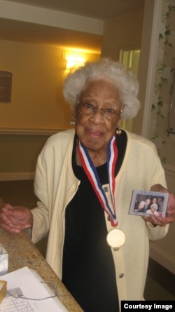 Madeline Brown, who recently celebrated her 100th birthday, says she never dieted or exercised and always did "her own thing." (Photo by Chuck Thornton)