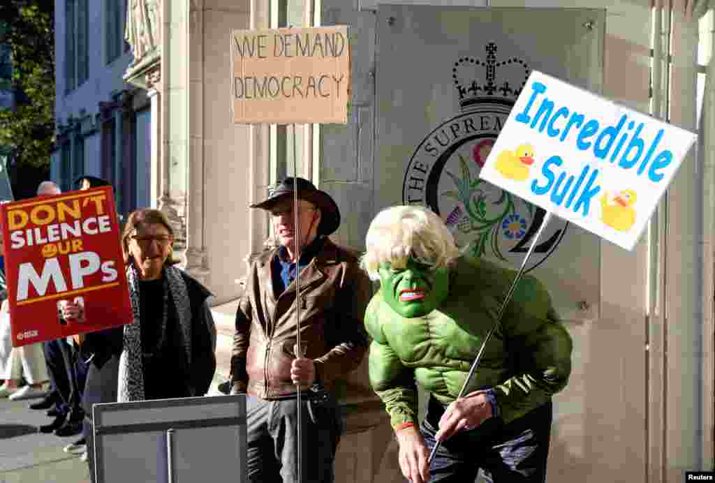 People protest outside the Supreme Court of the United Kingdom against Prime Minister Boris Johnson's decision to prorogue parliament, in London.