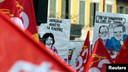 French labor union workers attend a demonstration against the French labor law proposal in Nice, France, as part of a nationwide labor reform protest, March 9, 2016. 