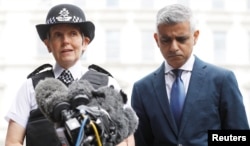 Mayor of London Sadiq Khan and Metropolitan Police Commissioner Cressida Dick visit the scene of the attack on London Bridge and Borough Market which left 7 people dead and dozens of injured in central London, Britain, June 5, 2017.