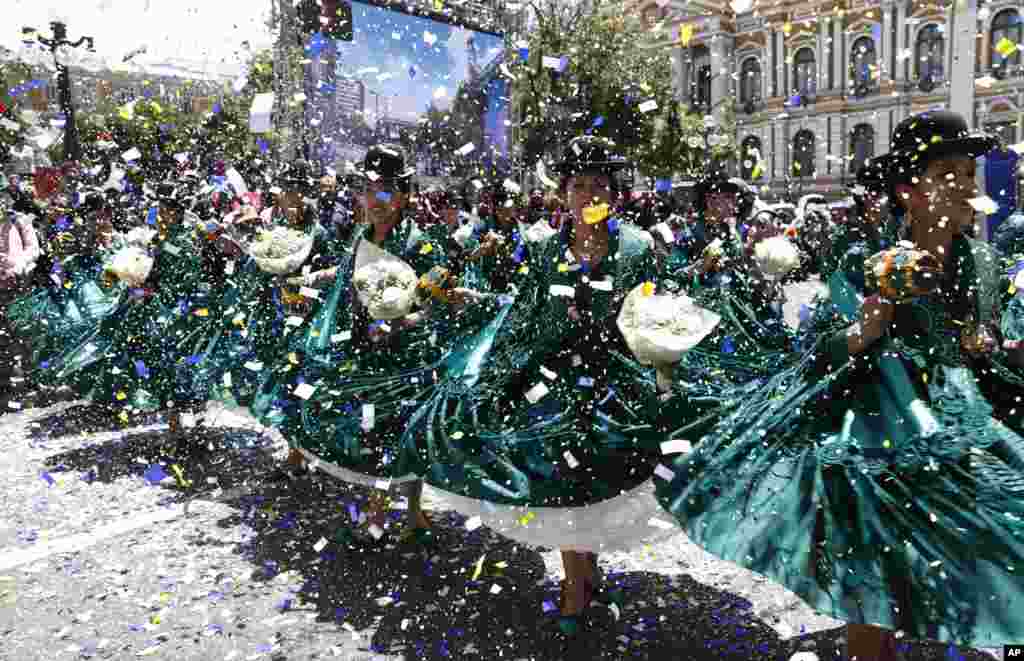 Dancers perform the &quot;Morenada&quot; during a parade in honor of &quot;Jesus del Gran Poder,&quot; or Jesus of Great Power in La Paz, Bolivia, Dec. 14, 2019.