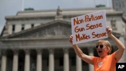 A demonstrator chant slogans during a march and rally against gun violence, Saturday, June 2, 2018, in New York. (AP Photo/Mary Altaffer)