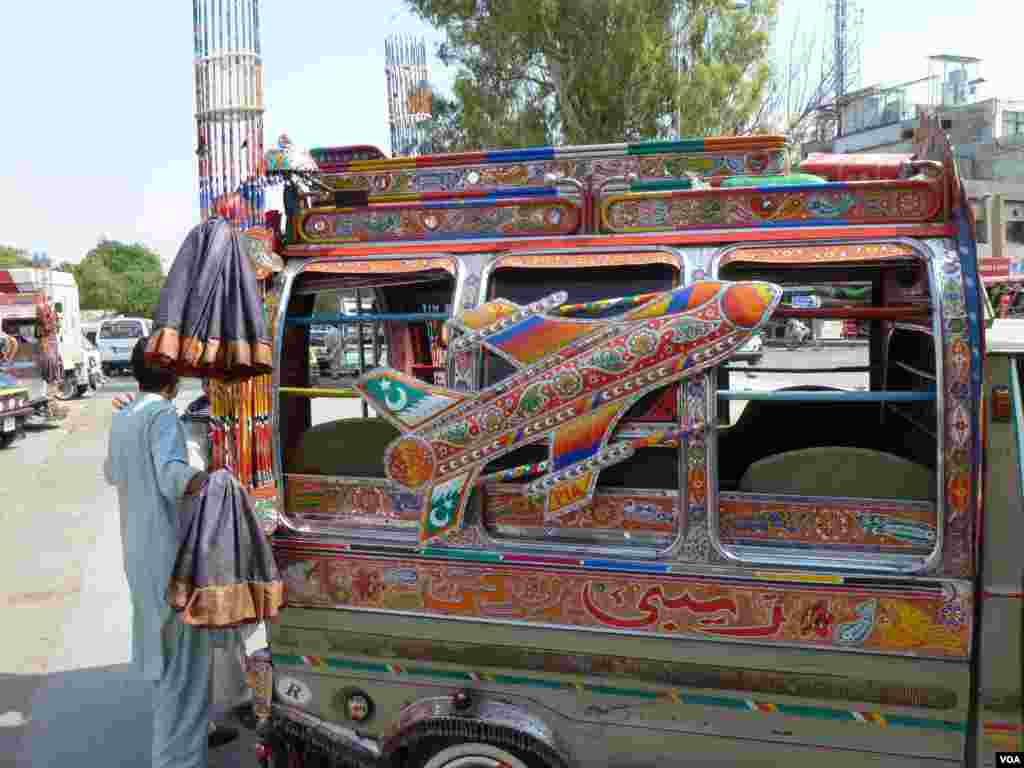 A heavily-decorated bus in Islamabad, Pakistan, July 10, 2012. (S. Gul/VOA)