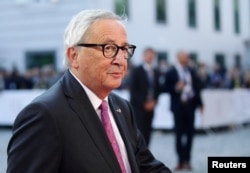 FILE - European Commission President Jean-Claude Juncker arrives for the informal meeting of European Union leaders in Salzburg, Austria, Sept. 20, 2018.