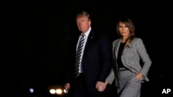 Ảnh tư liệu - Tổng thống Donald Trump và Đệ nhất phu nhân Melania trở lại Nhà Trắng ở Washington DC ngày 10/5/2018.