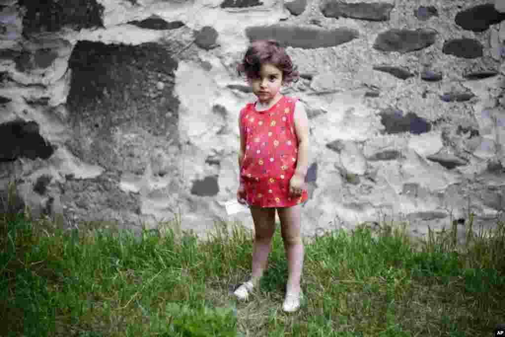 Keti Doijashvili, 3, was born on August 8, 2008 while her village was being bombed. (Yuli Weeks for VOA)