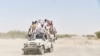 Des Tchadiens traversent le désert à bord d’une camionnette bondée, pour se rendre à Bol, dans le sud du Tchad, le e 9 novembre 2018. 