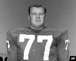 FILE - John Madden, tackle for the Philadelphia Eagles, poses in July 1959, location not known.