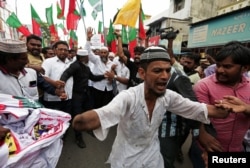 Demonstrators shout slogans during a protest against what the demonstrators say are killings of Rohingya people in Myanmar, in Chennai, India, Sept. 8, 2017.