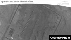 Wani hoto da NATO ta saki Afrilu 10, 2014 dake nuna tankokin yaki da motocin sintirin sojoji a fagen daga na kasar Rasha, a kusa da Kuzminka, Rasha dake kusa Ukraine. (DigitalGlobe/NATO ACO PAO)