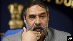 Indian Commerce Minister Anand Sharma addresses a press conference in New Delhi, India, November 25, 2011. 
