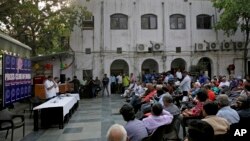 Press Club of India President Gautam Lahiri addresses a gathering of journalists in New Delhi, India, April 3, 2018. 