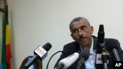 Ethiopian government spokesman, Shimeles Kemal speaks in Addis Ababa on March 15, 2012, where he announced that Ethiopia had attacked an Eritrean military base today, where rebel groups are armed and trained by the Eritrean government.