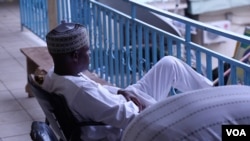 A man wearing a bama cap. Bama was nearly wiped out by Boko Haram. (C. Oduah/VOA)